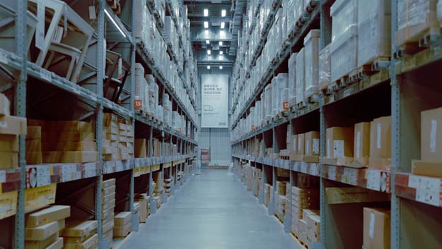 A high-tech warehouse facility showing organized inventory management and logistics operations