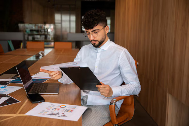 a man comparing erp software features