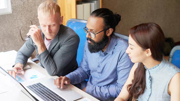 cross-functional team collaborating on ERP implementation and business process reengineering