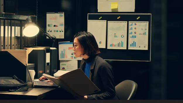 data analyst working on large datasets to analyse trends