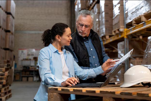 employees checking current stock and inventory levels on ERP automation
                                    software