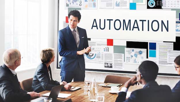 team discussing processes to automate using ERP